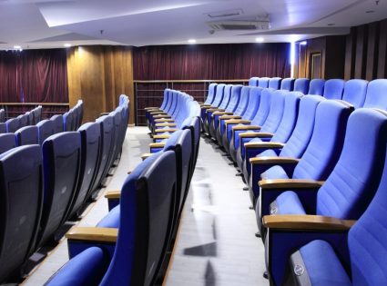 row of chair in theater interior